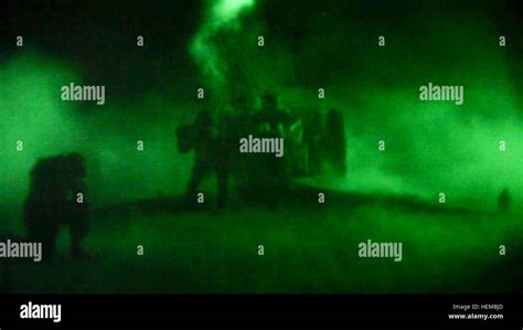 Afghan National Army Soldier Fire A D30 Howitzer During A Night Fire