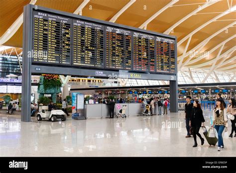 Departure Board At Shanghai Pudong International Airport China 2014