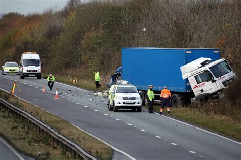 Emergency Services Attend The Scene Of A Collision On The A19