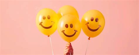 Premium Photo Three Yellow Balloons With Smiley Faces On Them With A