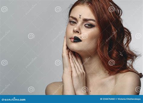 Red Haired Woman Naked Shoulders Zodiac Sign On Face Gemini Stock Photo