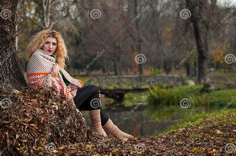 Beautiful Woman Posing In Park During Autumn Season Blonde Girl