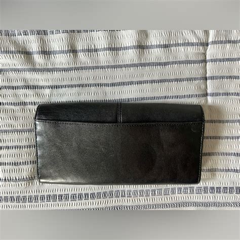 Black Coach Wallet With Twist Lock Gem