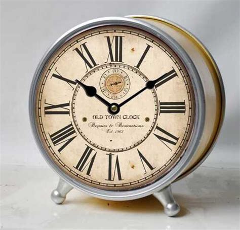 Brown Analog Table Alarm In Round Shape And Steel Material Dial