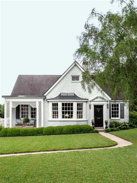 Discover the Charm of a White Brick House with White Shutters - See ...