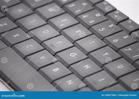 The black laptop keyboard stock photo. Image of contact - 129627386