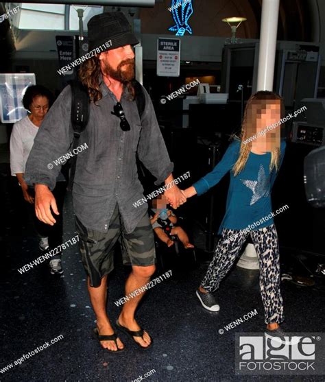 A scruffy Christian Bale arrives at Los Angeles International Airport (LAX), Stock Photo ...