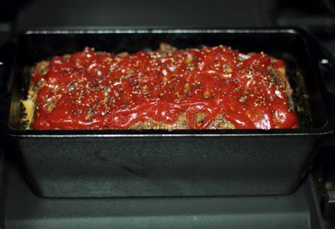 Homemade Meatloaf Baked in a Cast Iron Loaf Pan Stock Image - Image of baking, meat: 149468251