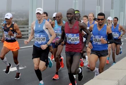 Runners Cross The Verrazano Narrows Bridge At NYC Marathon New York