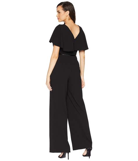 Calvin Klein Synthetic Ruffle Sleeve Belted Jumpsuit Black Jumpsuit And Rompers One Piece Lyst