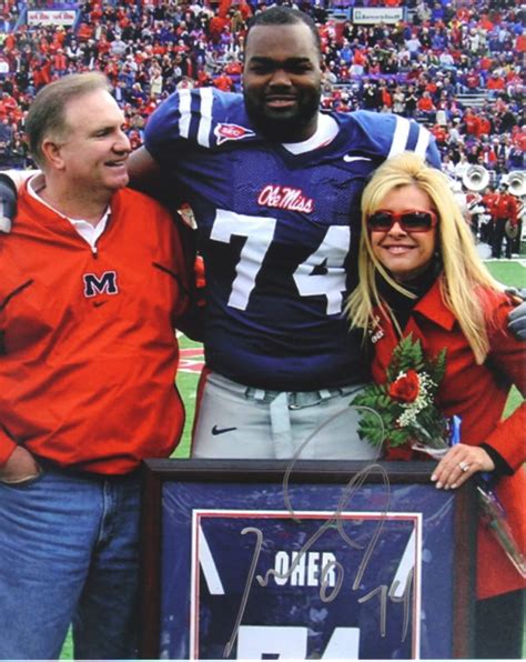 Michael Oher And His Parents Leigh Anne And Sean Tuohy The