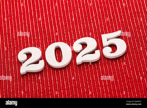 Happy new year 2025 in white letters on red background Stock Photo - Alamy