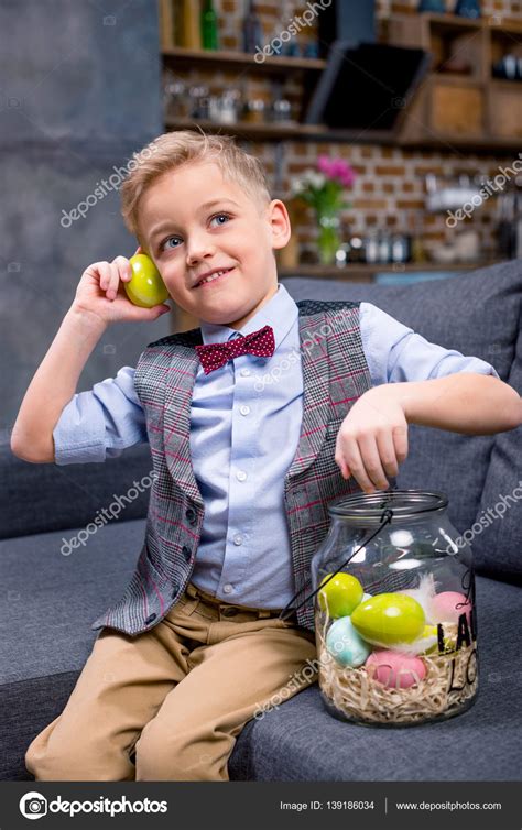 Little boy with Easter eggs — Stock Photo © NatashaFedorova #139186034