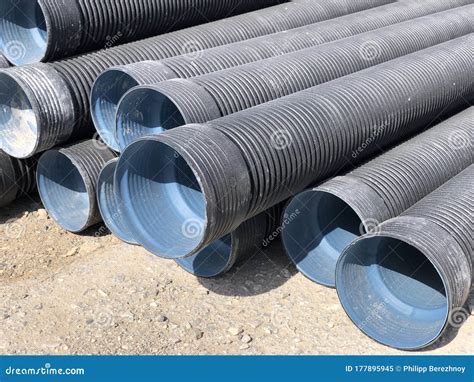 Stacked Corrugated Pvc Pipes At The Outdoor Warehouse Drainage