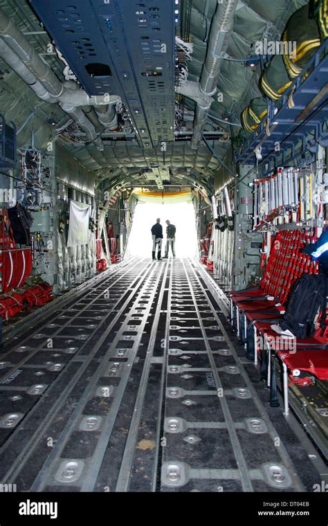 Creative interior image of C130 Military cargo aircraft with cargo bay ...