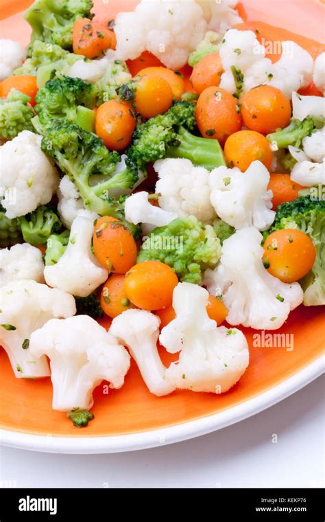 Steamed Broccoli Cauliflower And Carrot Stock Photo Alamy