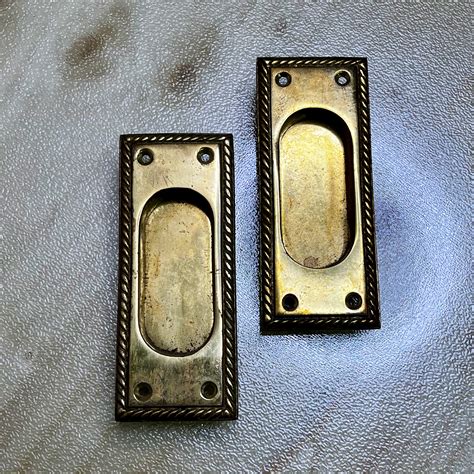 Pair of Brass Pocket Door Handles - Historic House Salvage