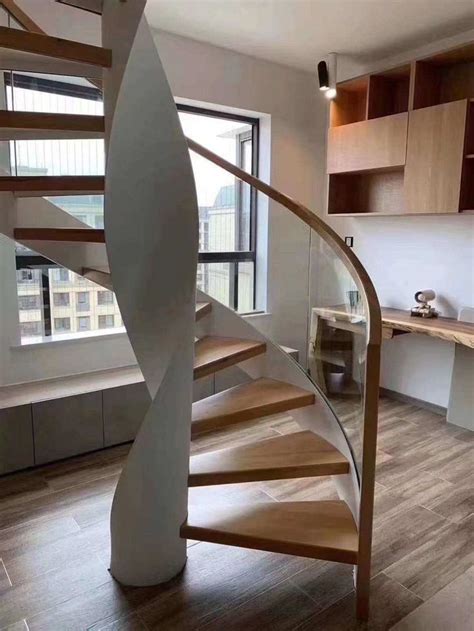 Interior rounded staircase design from NST Building ,which is custom ...