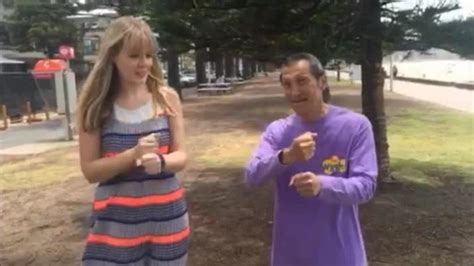 Original purple Wiggle Jeff Fatt gives our reporter a Hot Potato lesson ...