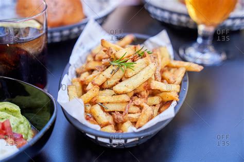 fries in basket stock photos - OFFSET