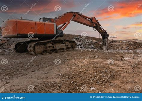 Excavator With Hydraulic Hammer On Road Construction Works Stock Image