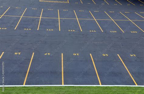 Empty parking lot with yellow lines and numbers Stock Photo | Adobe Stock