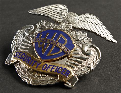 Warner Bros. Security Hat Badge | Prop Store - Ultimate Movie Collectables