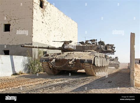 An Israel Defense Force Merkava Mark II main battle tank demonstrates ...