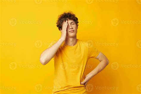 Young Curly Haired Man Yellow T Shirt Fashion Hand Gestures Isolated