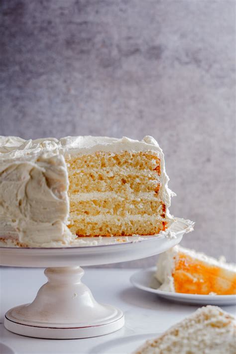 Lemon yoghurt layer cake with white chocolate frosting - Simply Delicious