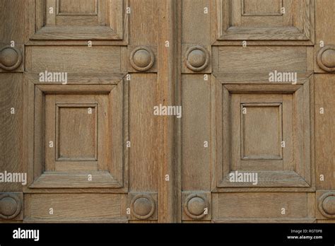 Old wooden gate with squares and circles motif. Antique door detail ...