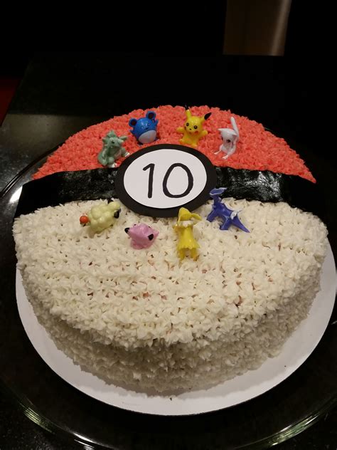 Pokemon Pokeball Cake With Plastic Figurines Added On Top Cake