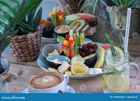 Plates Of Traditional Ethiopian Food With Fruits And Vegetables On A