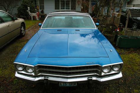 OLD PARKED CARS.: 1973 Plymouth Satellite Sebring.