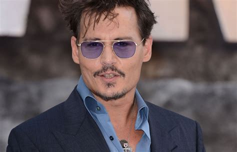 Johnny Depp Injures Hand Flies Home From Australia For Surgery