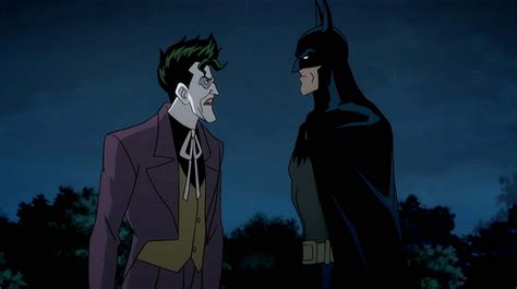 Download The Joker Confronts Batman In An Intense Scene From Batman