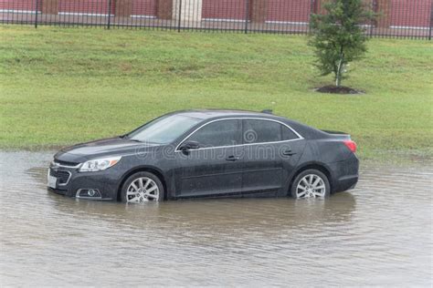 Car Swamped By Hurricane Flood Water In East Houston Texas USA Stock