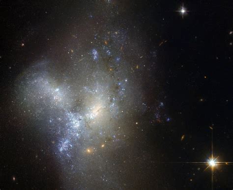 NGC 1487: Hubble Space Telescope Captures Beautiful Galactic Merger ...