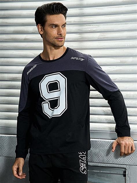 Manfinity Sport Corelite Camiseta deportiva para hombre con gráficos de