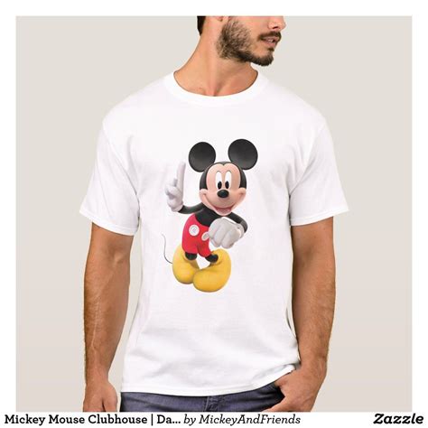 a man wearing a mickey mouse t - shirt