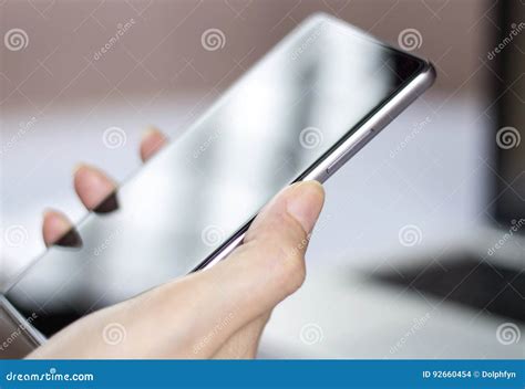 Hand Holding Mobile Smartphone With Blank Screen Editorial Stock Image