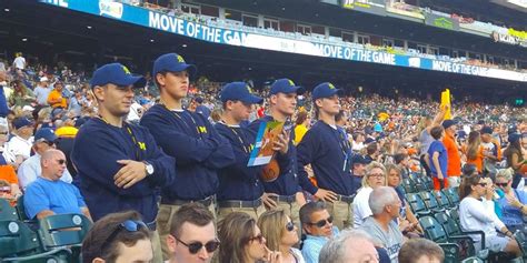 Michigan Football Coach Jim Harbaugh Costumes At Tigers Game Sports