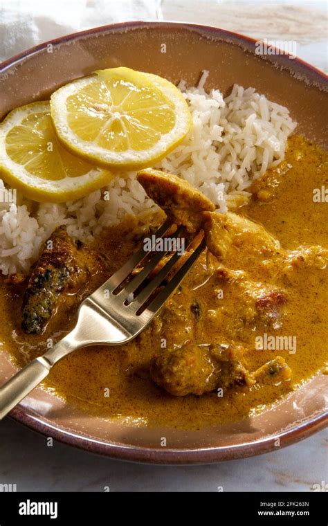 African Chicken Curry Also Known As Kuku Paka Served With Rice And