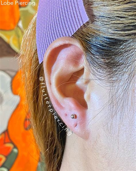 Flutter Piercing On Instagram Third Mid Lobe Piercing Lobe