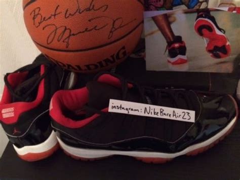 Michael Jordan's Air Jordan 11 Low "Black/Red" PE - SneakerNews.com