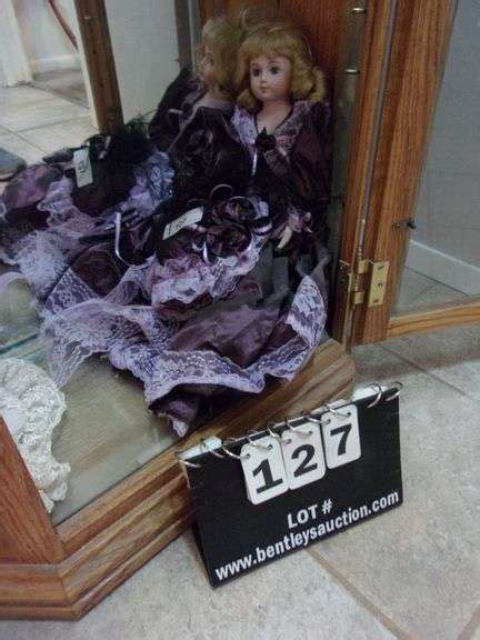 BLONDE CURLY HAIRED BLUE EYED VICTORIAN STYLED PORCELAIN DOLL IN PURPLE Bentley Associates LLC