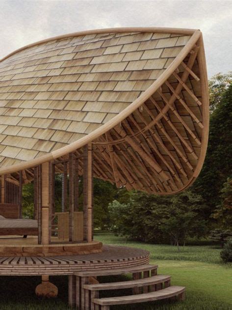 A Large Wooden Structure Sitting On Top Of A Lush Green Field