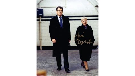 "007 Die Another Day" - Judi Dench Signed Photograph - CharityStars