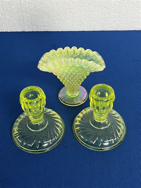 Lot 9 Fenton Opalescent Yellow Hobnail Fan Vase And Two Vaseline Glass Candle Holders Van Metre