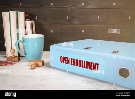 Open Enrollment Registration And Information Concept Office Desk